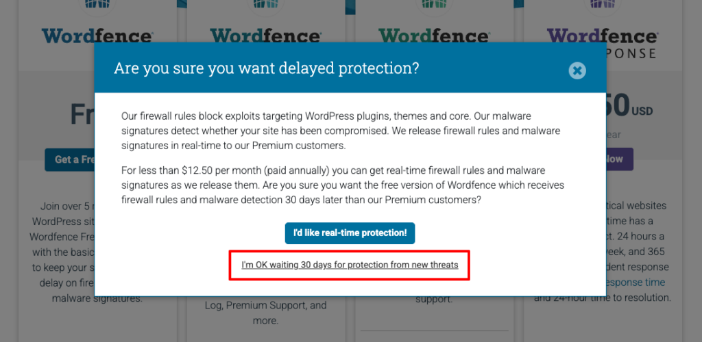 有料プランへの案内ポップアップ—無料プランを選ぶ「I'm OK waiting 30 days for protection from new threats」ボタン